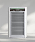 Air purifier with digital display on a gray background